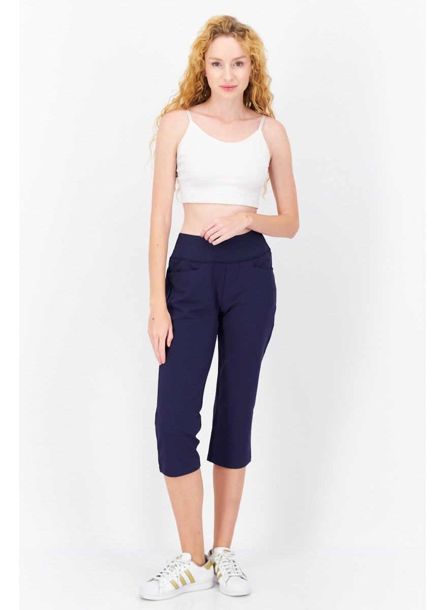 PUMA Women Sportswear Fit Training Capri Legging, Navy  - Image 4