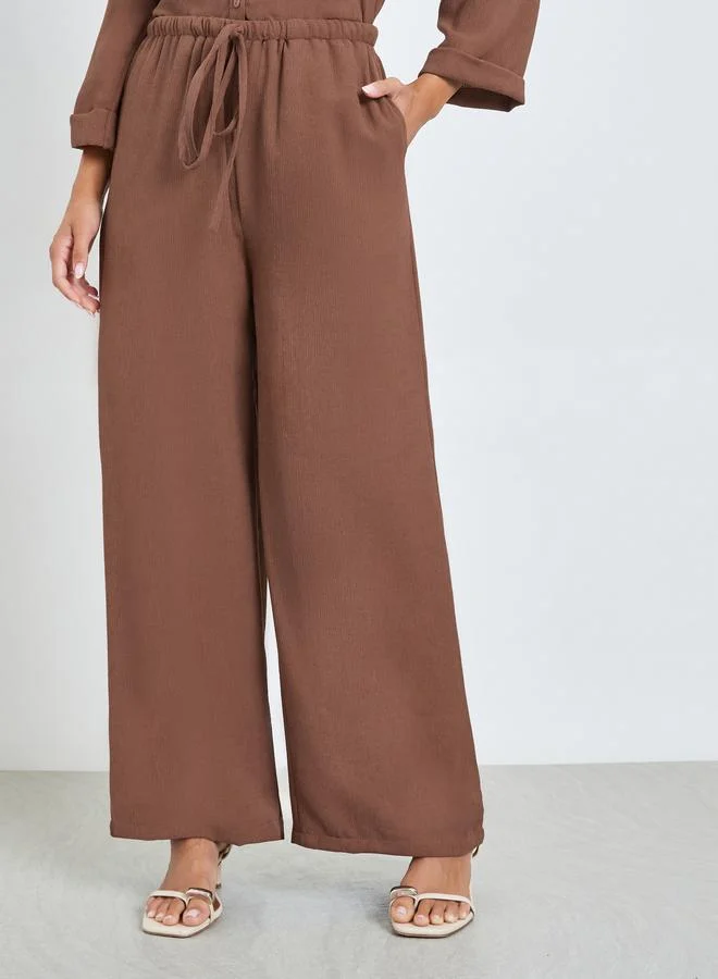 Styli Brown Crushed Textured Wide Leg Pants