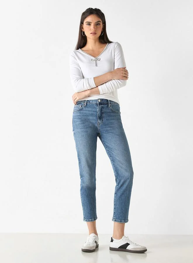 لي كوبر بنطلون جينز سادة بقصّة عادية وجيوب من لي كوبر