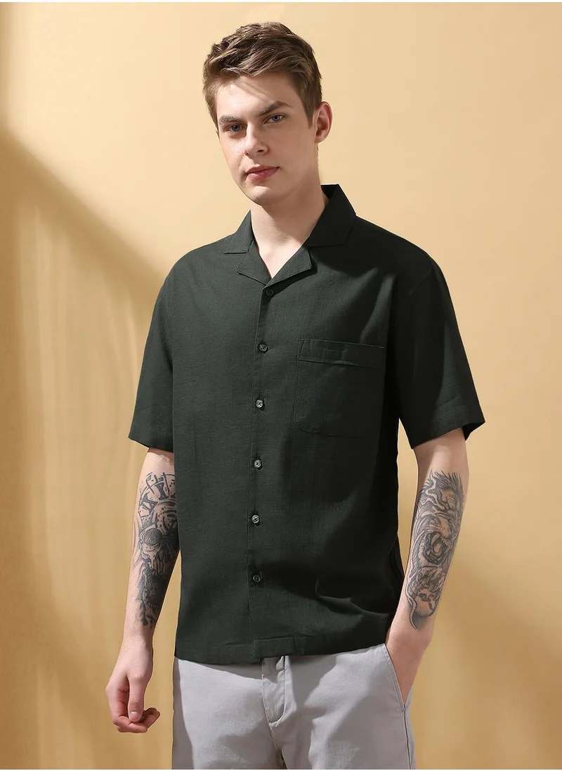 Dennis Lingo Upgrade your wardrobe with this premium Dark olive Relaxed fit Shirts Textured design crafted from Cotton Slub featuring Half Sleeve with Button closure.