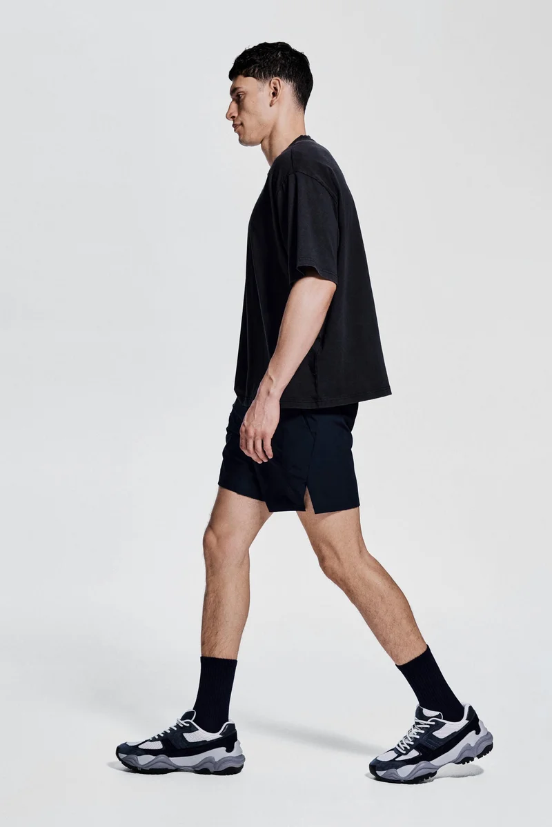 H&M Boxy-style sports top with DryMove™