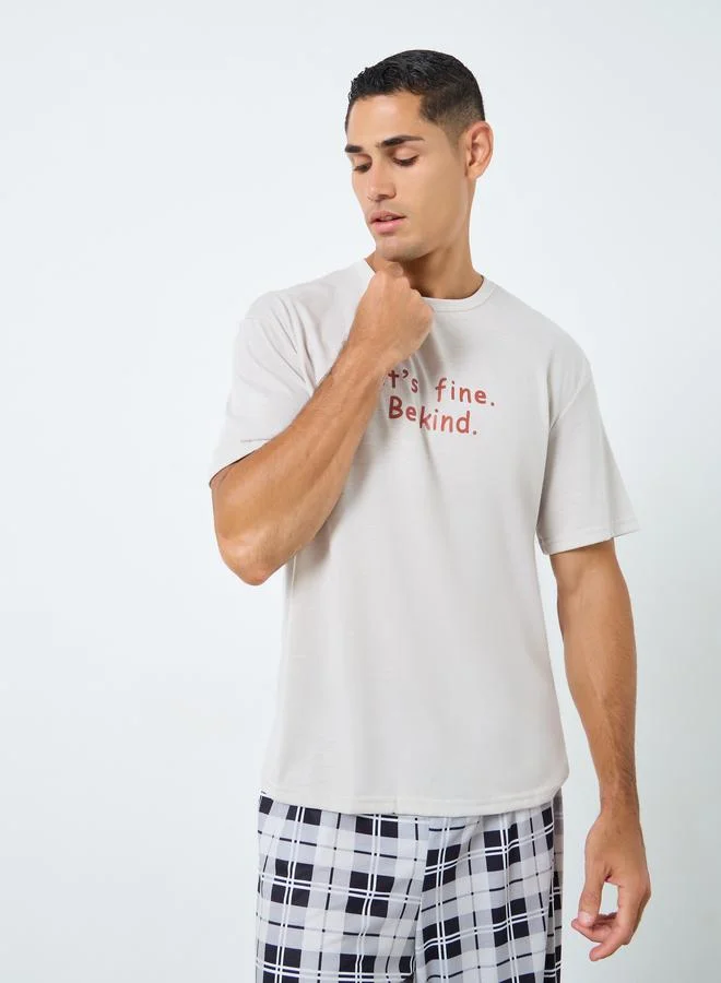 Styli Styli Men Slogan Print T-Shirt and Checked Pyjama Set