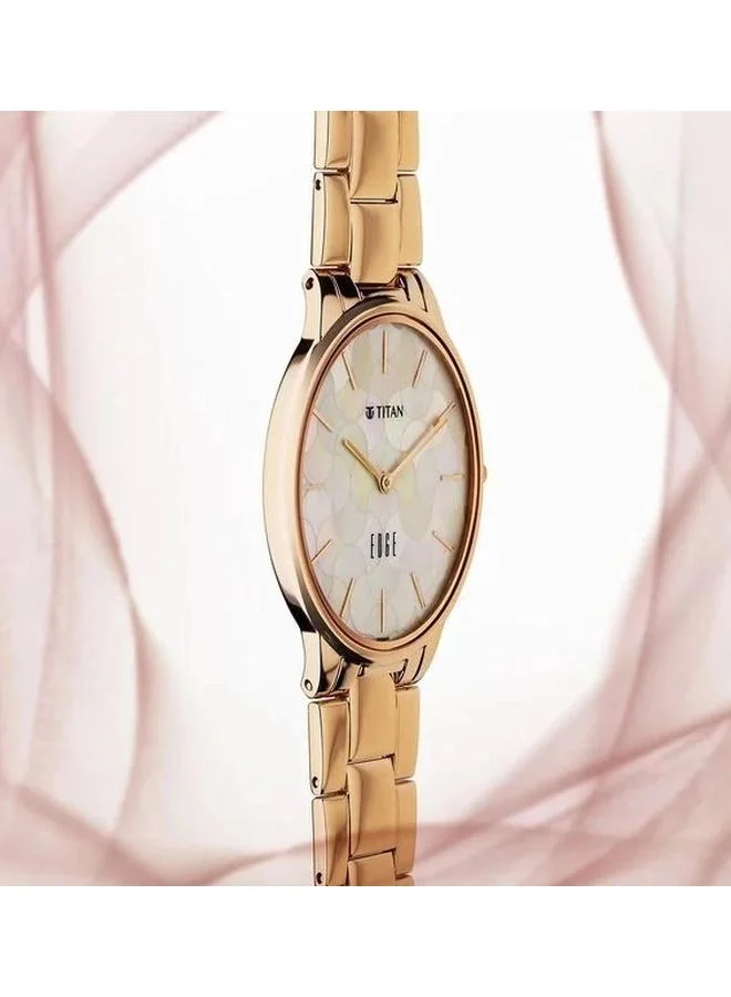تيتان ساعة نسائية بعقارب وسوار ستانلس ستيل ذهبي وردي