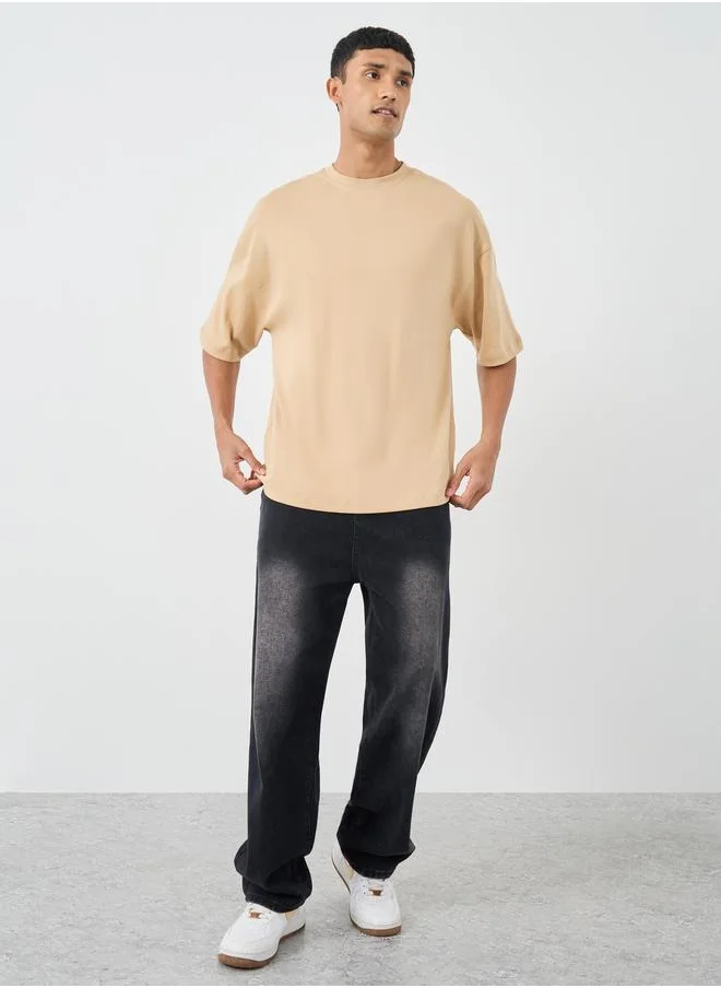 ستايلي Styli Slogan Print Boxy Fit Round Neck T-Shirt