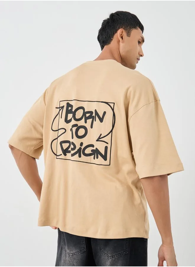 ستايلي Styli Slogan Print Boxy Fit Round Neck T-Shirt
