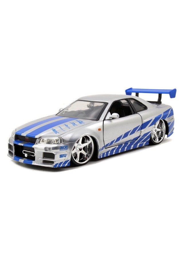 Jada Toys Fast & Furious Brian’s 2002 Nissan Skyline R34 Die-cast Car, 1:24 Scale, Silver & Blue - Image 1