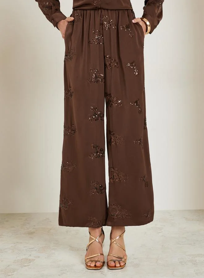ستايلي بنطال مزين بأرجل واسعة