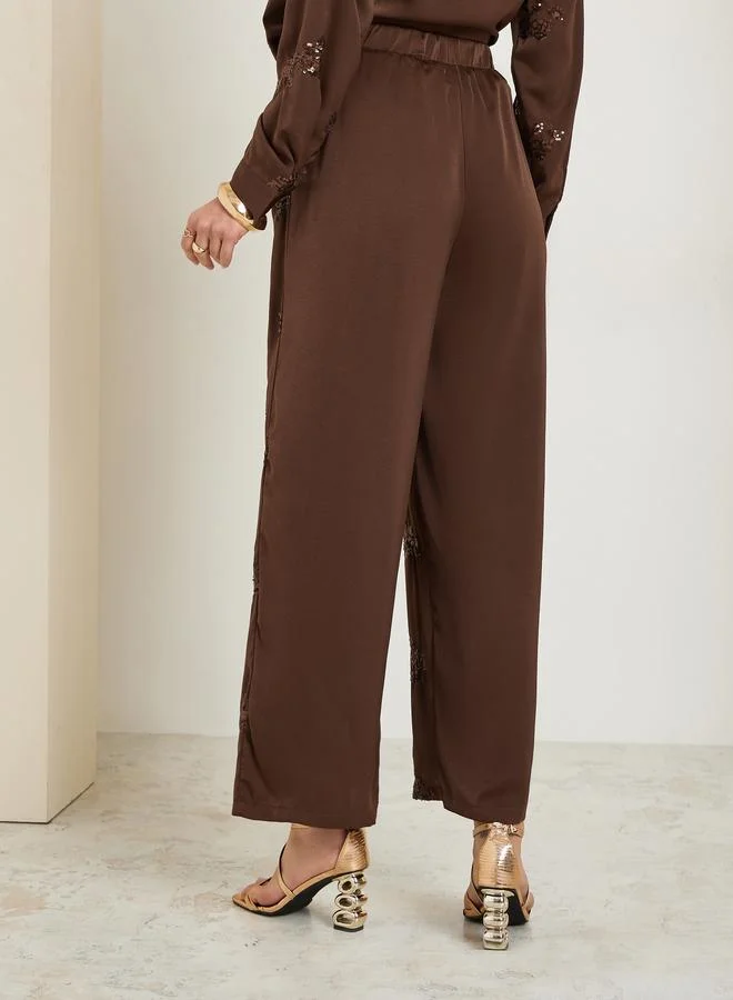 Styli  Women Brown Embellished Wide Leg Trousers for Women | Best Price UAE
