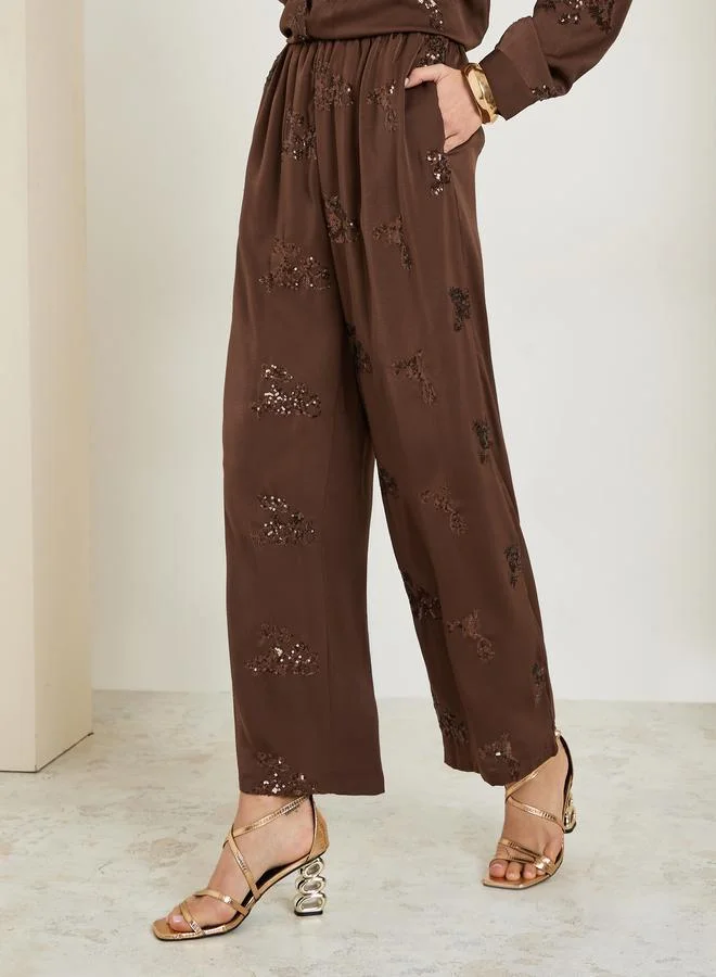 Styli  Women Brown Embellished Wide Leg Trousers for Women | Best Price UAE