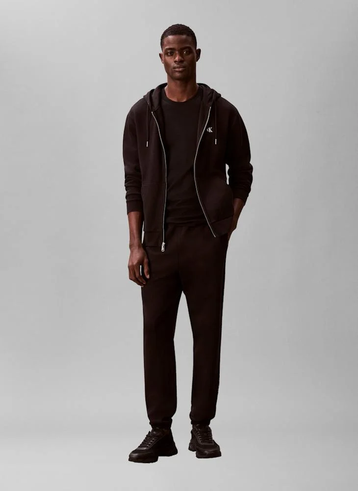 كالفن كلاين بنطلون رياضي بخصر مطاطي وأساور