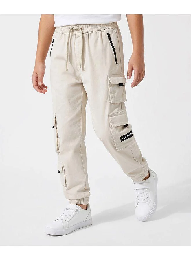 Primo Gino Primo Gino Cotton Woven Twill Lycra Full Length Joggers with Cargo Pockets - Light Grey