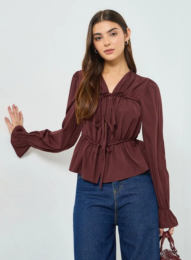 تايك تو بلوزة بيبلوم بياقة ورباط