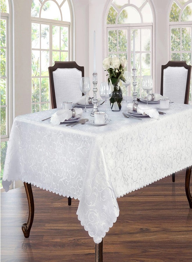 Newbridge Portofino Scalloped Damask Fabric Tablecloth, 52 x 70 Inch Rectangle, White, Wrinkle and Stain Resistant Fine Dining Holiday Party Table Cover - Image 1