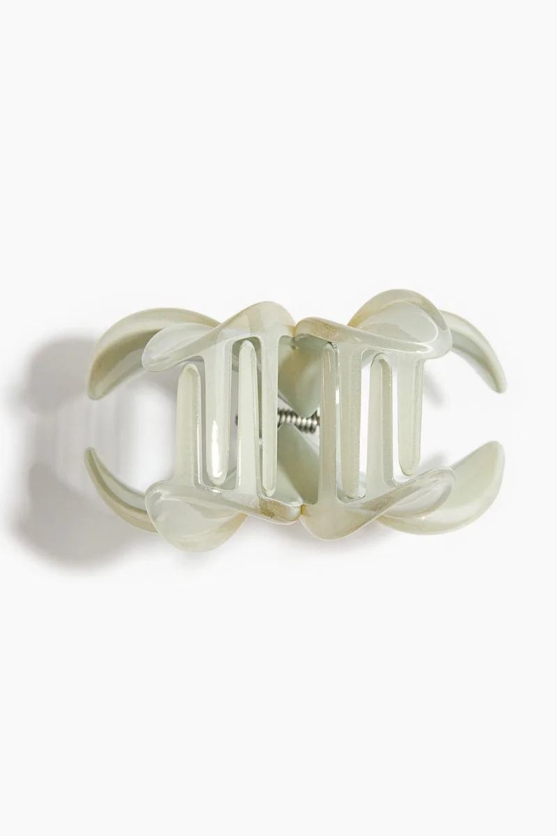 اتش اند ام مشابك شعر بشكل زهرة