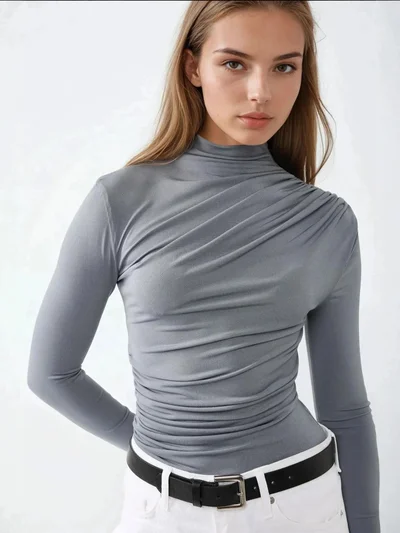 زوبعة بلوزة بياقة عالية وتفاصيل درابيه