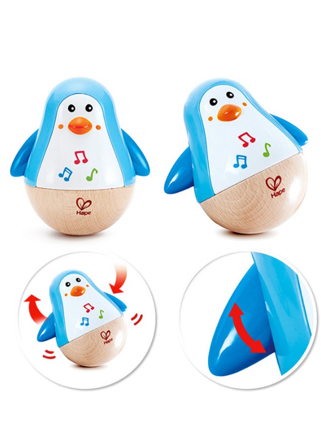 Hape Musical Penguin Roly-Poly Wobbler Toy, Beech Wood Material with Soothing Tinkling Sound, Early Learning Educational Indoor Play Toy for Babies 6–36 Months - Image 3