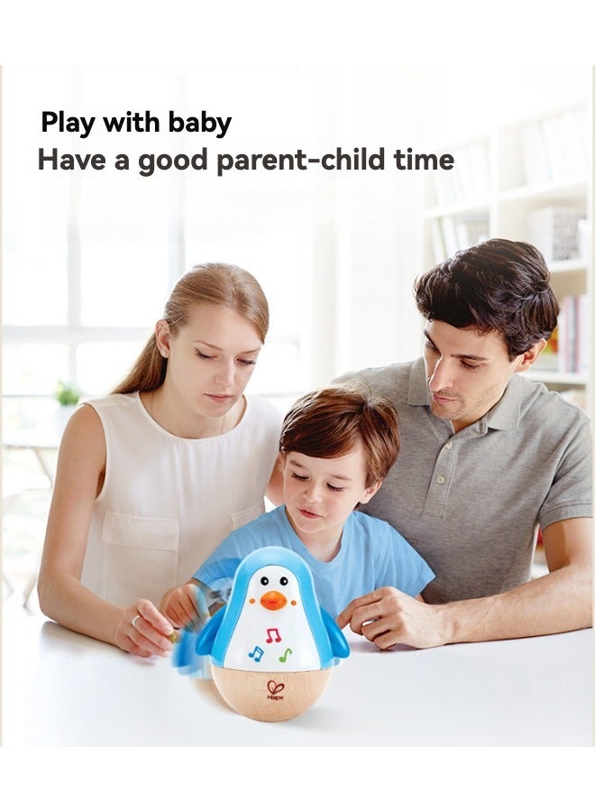 Hape Musical Penguin Roly-Poly Wobbler Toy, Beech Wood Material with Soothing Tinkling Sound, Early Learning Educational Indoor Play Toy for Babies 6–36 Months - Image 4
