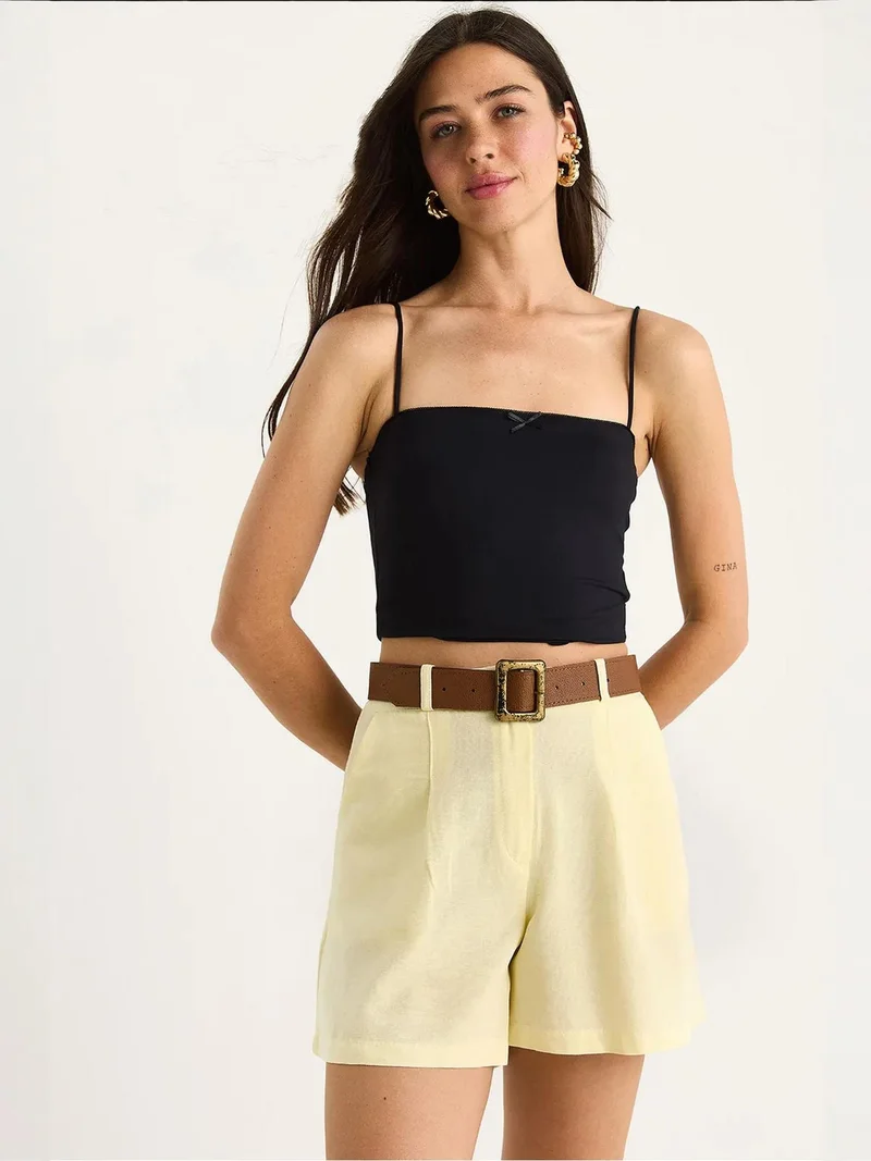 بيانكو لوتشي شورت واسع من مزيج الكتان من لوكسي بخصر مريح وجيوب