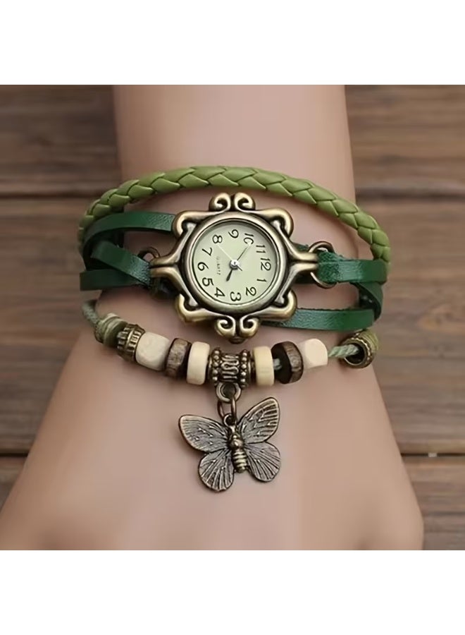 Classic wristwatch for girls featuring a green strap and a butterfly design. - Image 1