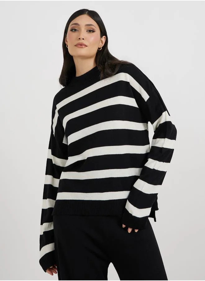 ستايلي Oversized Striped Sweater and Wide Leg Pants Co-Ords