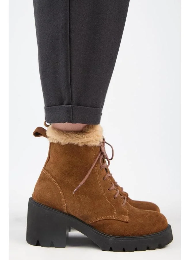 [Wilma] Women's genuine leather boot with fur lining and fur stripe, heeled.