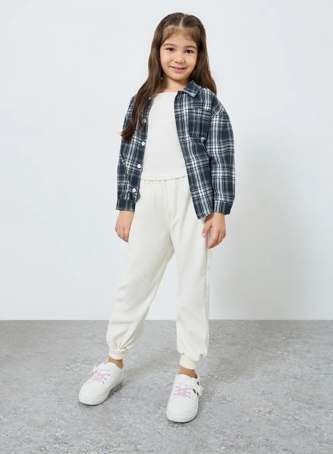 ستايلي بلوزة بطبعة مربعات مع جيب مُرقع