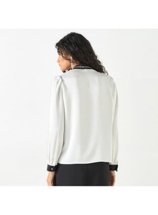 2Xtremz Embellished Top with Tie-Up Neck and Ruffle Detail - pzsku/Z195B0749F465B5F99DEAZ/45/_/1729773043/9f08bd45-d2be-4489-920e-7910af5f73d6