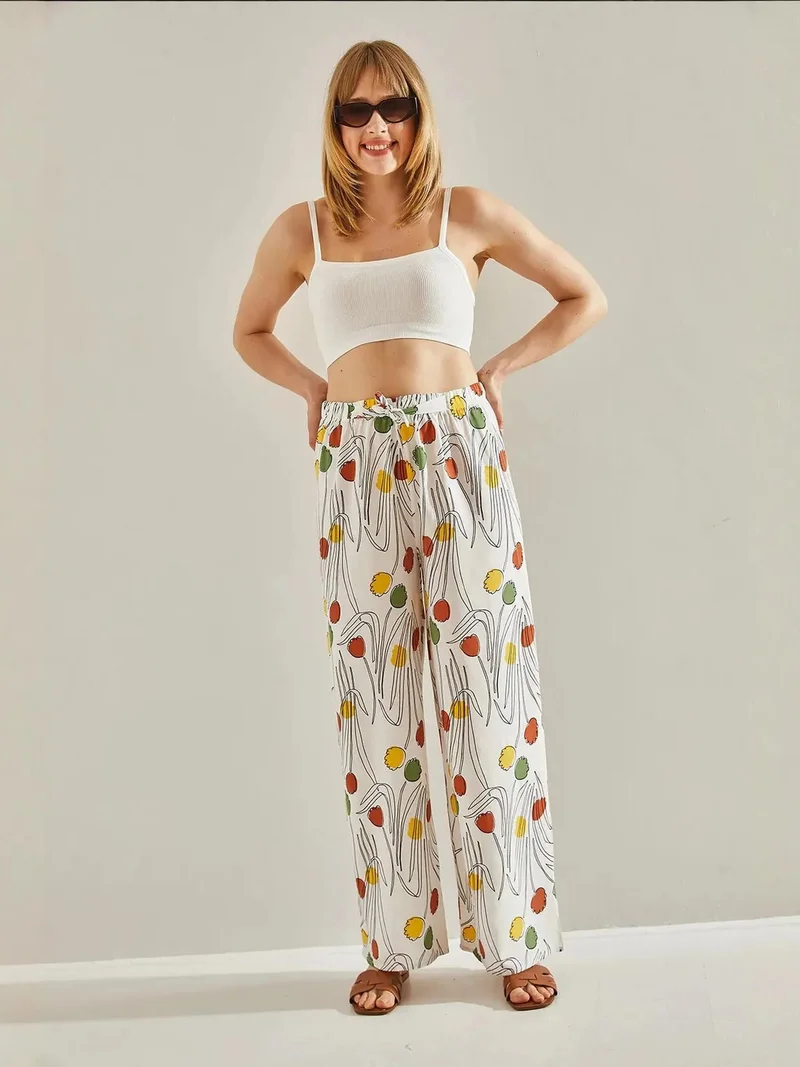 بيانكو لوتشي بنطلون بالازو طويل مطبوع من لوتشي مع ربطة عنق