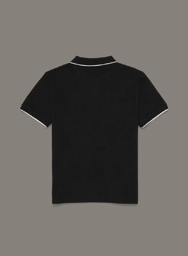 كالفن كلاين جينز قميص بولو بأطراف ملونة