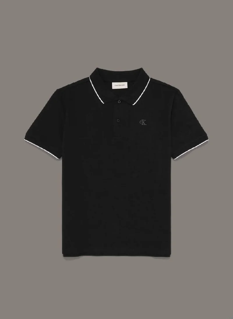 كالفن كلاين جينز قميص بولو بأطراف ملونة