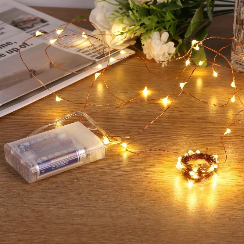 Sanniu Fairy Lights Battery Operated 8 Packs Mini Battery Powered Copper Wire Starry String Lights for ChristmasBedroom PartiesWeddingIndoorHome Decoration 5m16ft Warm White