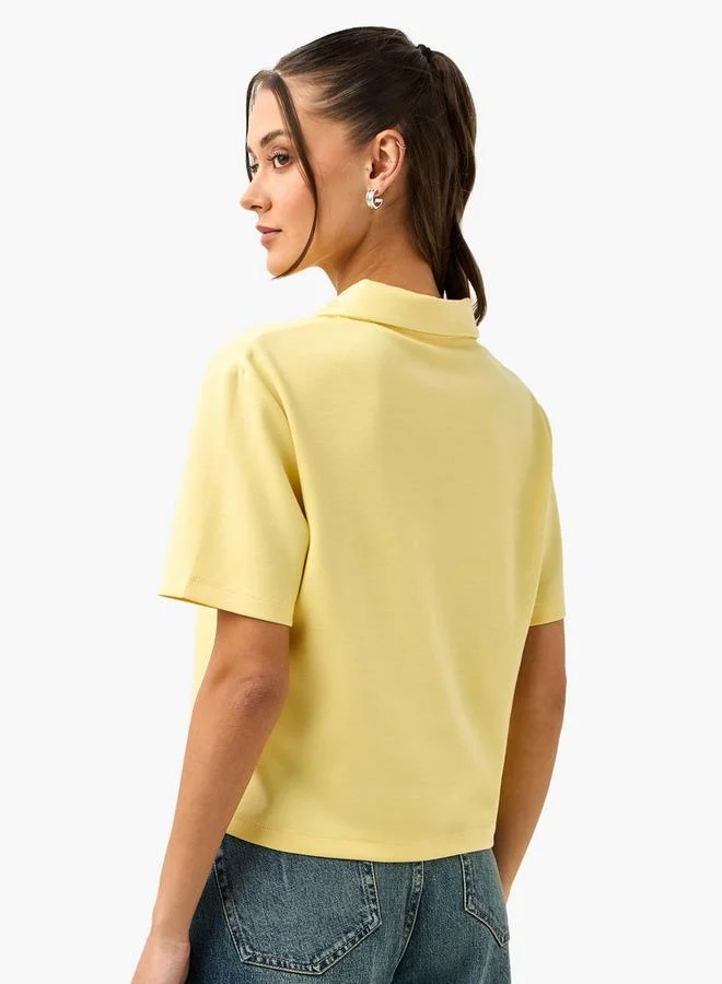 SP Characters  Garfield Print Cropped Polo T-shirt for Women | Best Price UAE