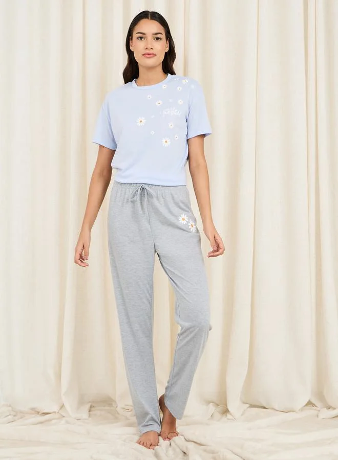 ستايلي Daisy Print Drop Shoulder T-Shirt and Melange Pyjama Set