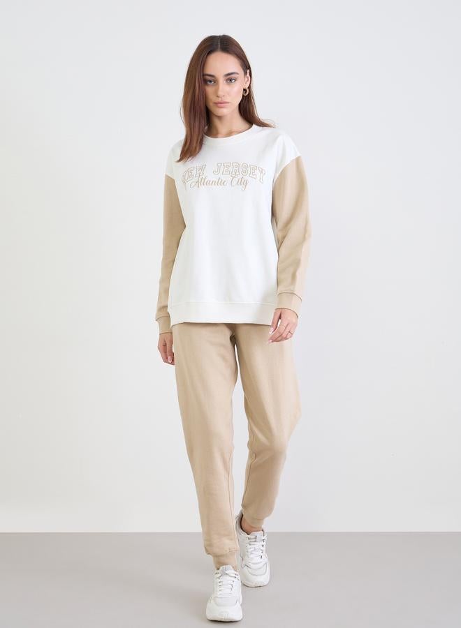 ستايلي طقم بيجاما من جوغر وسويت شيرت طويل بقصة عادية - Image 2
