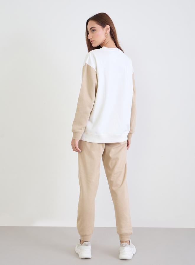 ستايلي طقم بيجاما من جوغر وسويت شيرت طويل بقصة عادية - Image 4