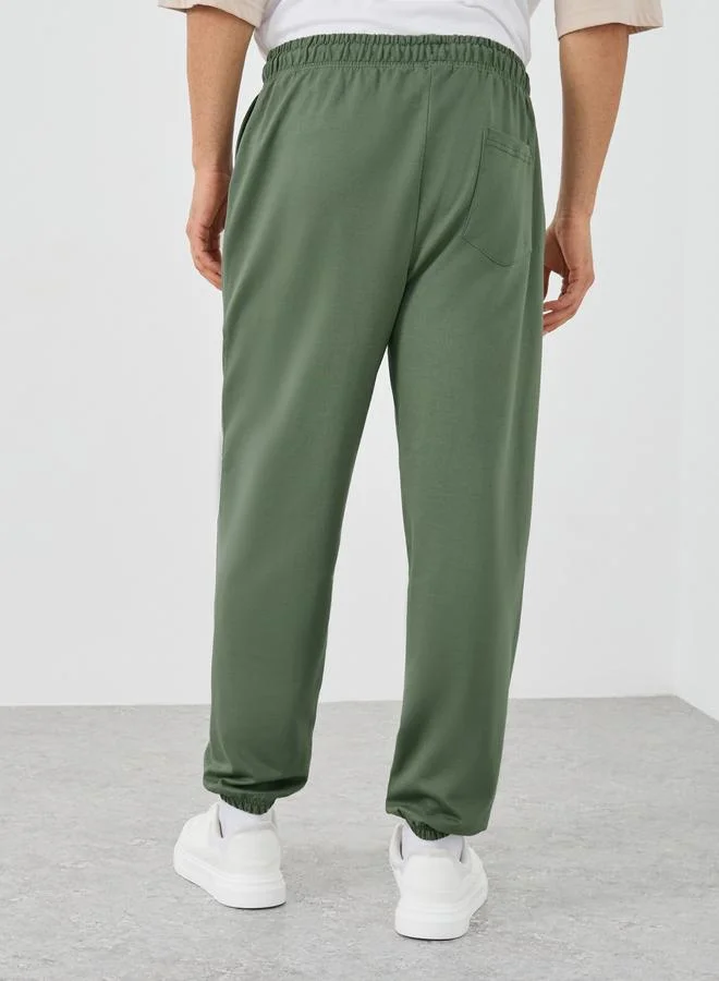 Styli Styli Textured Slogan Print Oversized Joggers