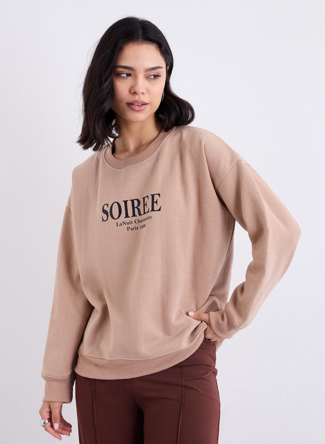 Styli Women Tan Oversized Slogan Print Sweatshirt - Image 1