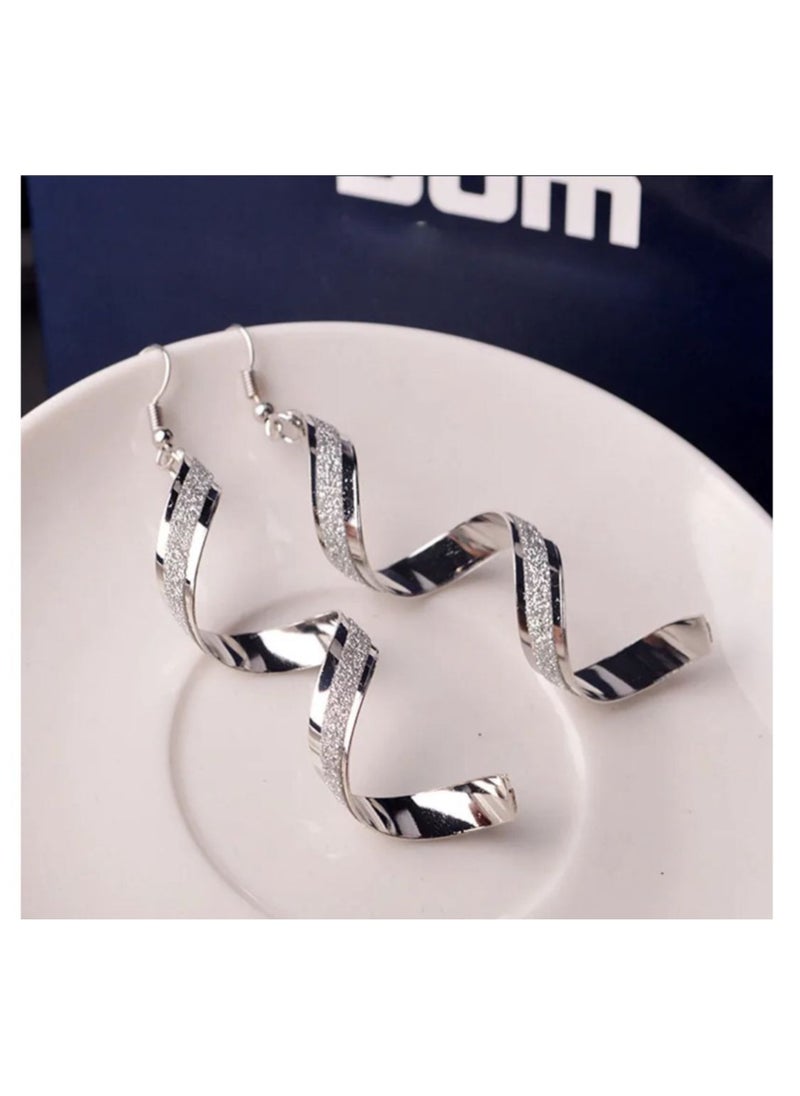 Dangle earrings with a distinctive and elegant design