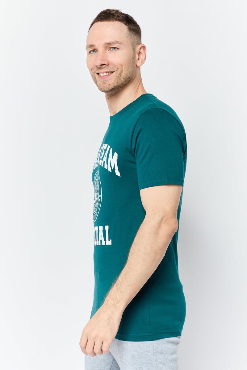 PUMA تي شيرت رجالي بقصة مريحة بأكمام قصيرة وشعار العلامة التجارية، أخضر - Image 3