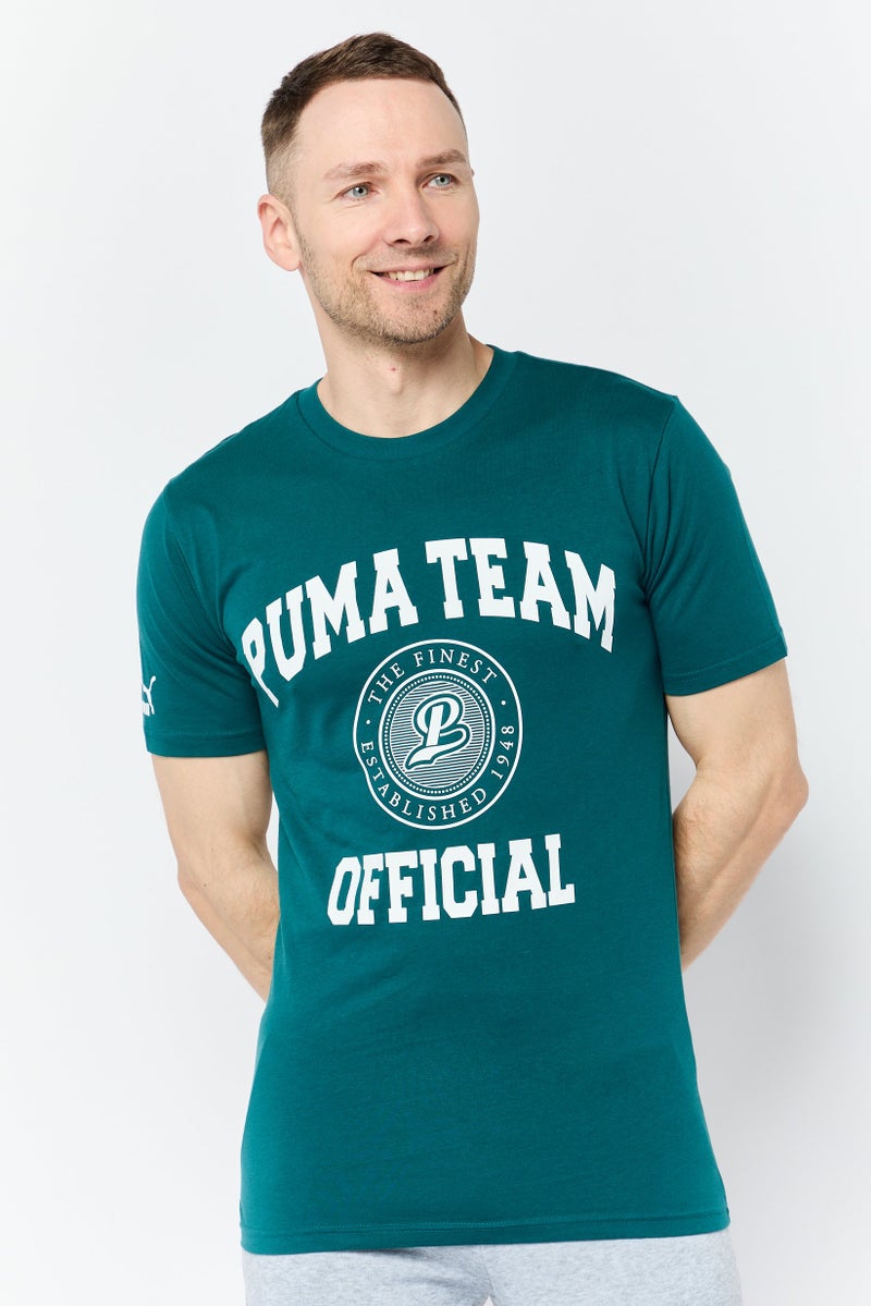 PUMA تي شيرت رجالي بقصة مريحة بأكمام قصيرة وشعار العلامة التجارية، أخضر - Image 1