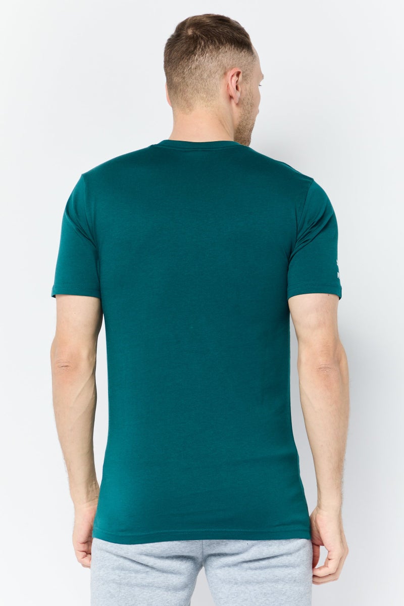 PUMA تي شيرت رجالي بقصة مريحة بأكمام قصيرة وشعار العلامة التجارية، أخضر - Image 4