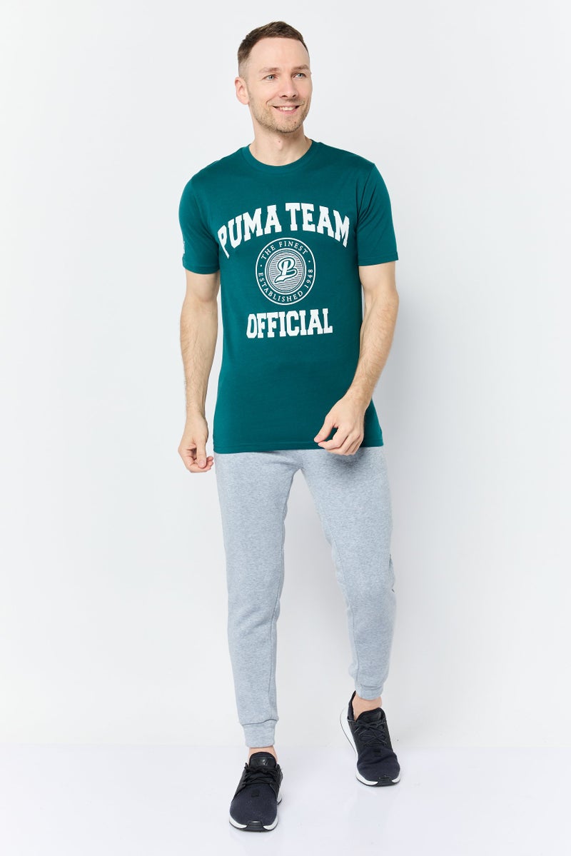 PUMA تي شيرت رجالي بقصة مريحة بأكمام قصيرة وشعار العلامة التجارية، أخضر - Image 2