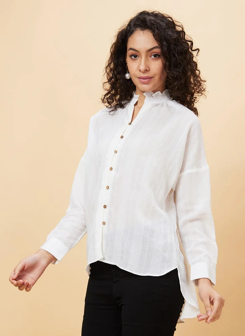 جلو باص بلوزة نسائية مخططة بياقة عالية