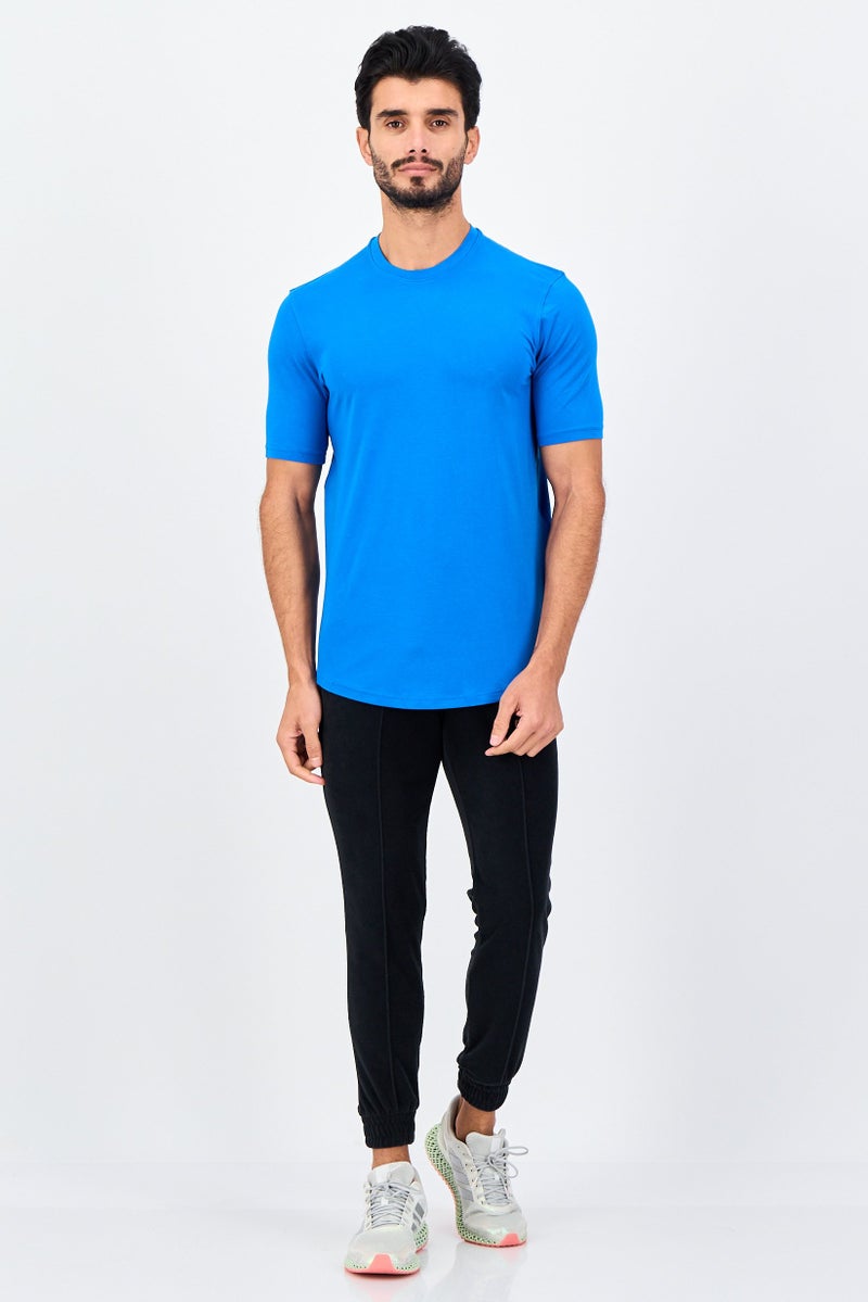 UNDER ARMOUR تي شيرت رياضي للرجال بأكمام قصيرة مناسب في الهواء الطلق، أزرق - Image 4