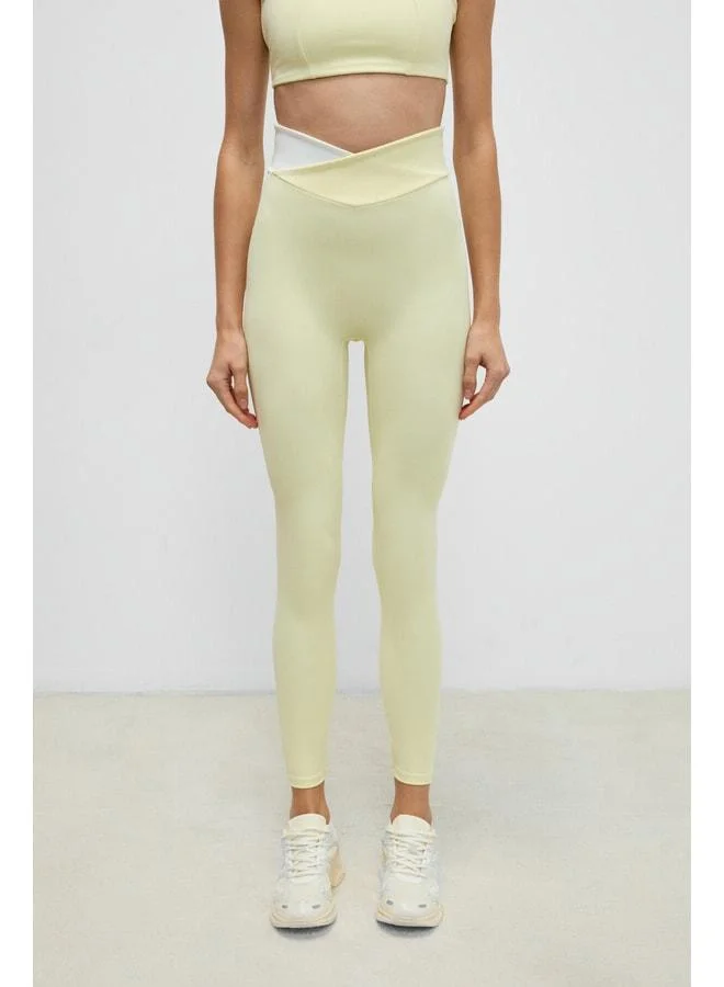 Urban Beat  JULSEN Women's Soft and Flexible Textured Asymmetric Contrast Waist Detailed Yellow Leggings. for Women | Best Price UAE