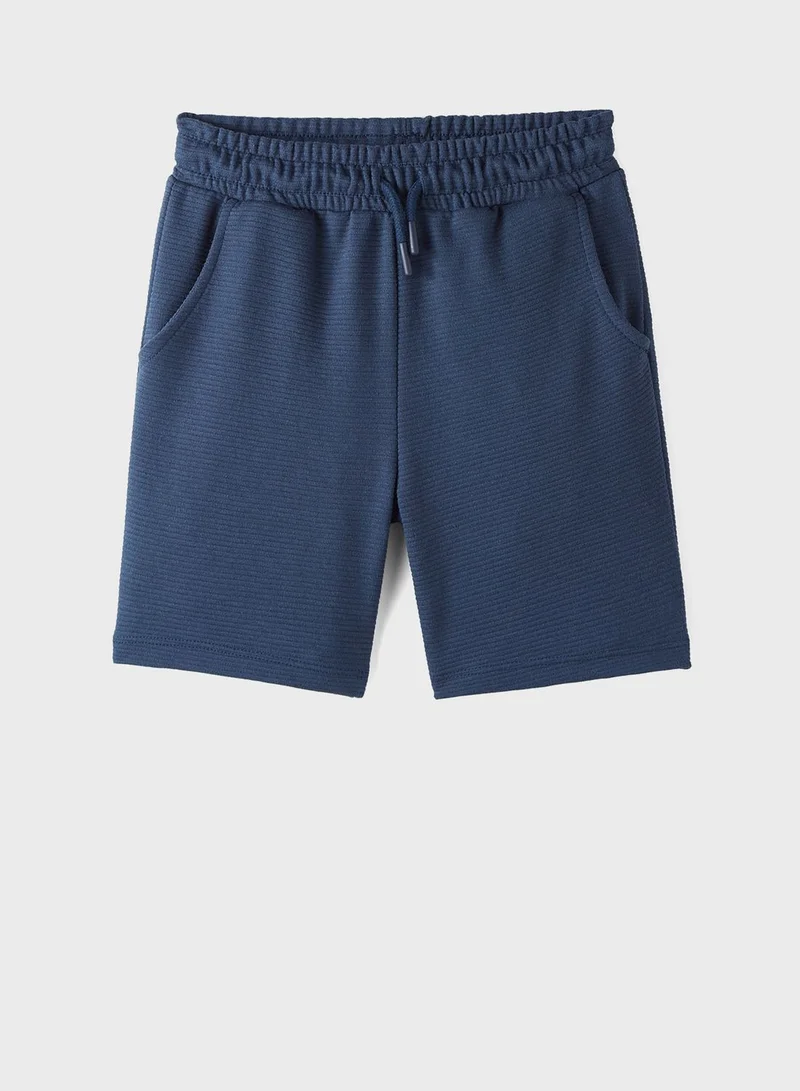 جون Textured Shorts