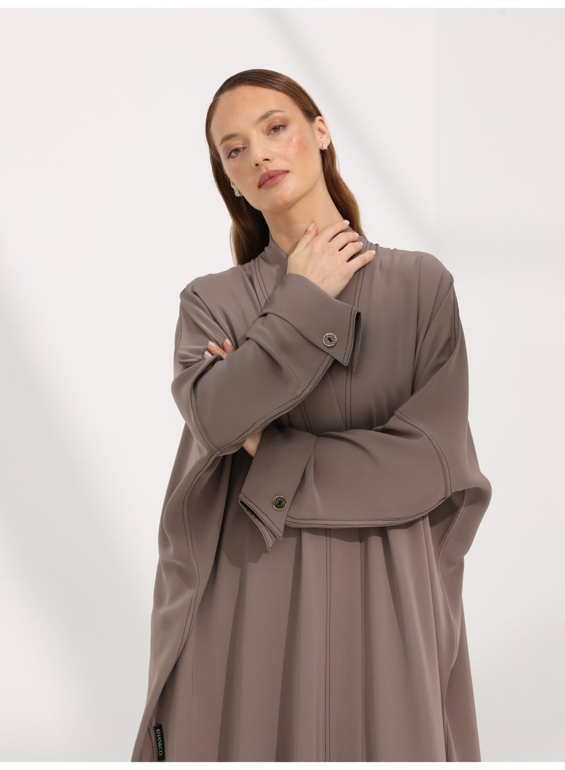 Khan&Co. Seven Seas Mocha Abaya in an earthy crepe fabric colour with two gold KHAN&CO logo buttons - by Abdullah Khan - Image 3