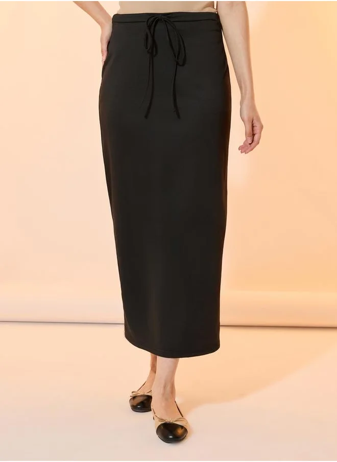 Styli Solid Back Slit Midi Skirt with Drawstring
