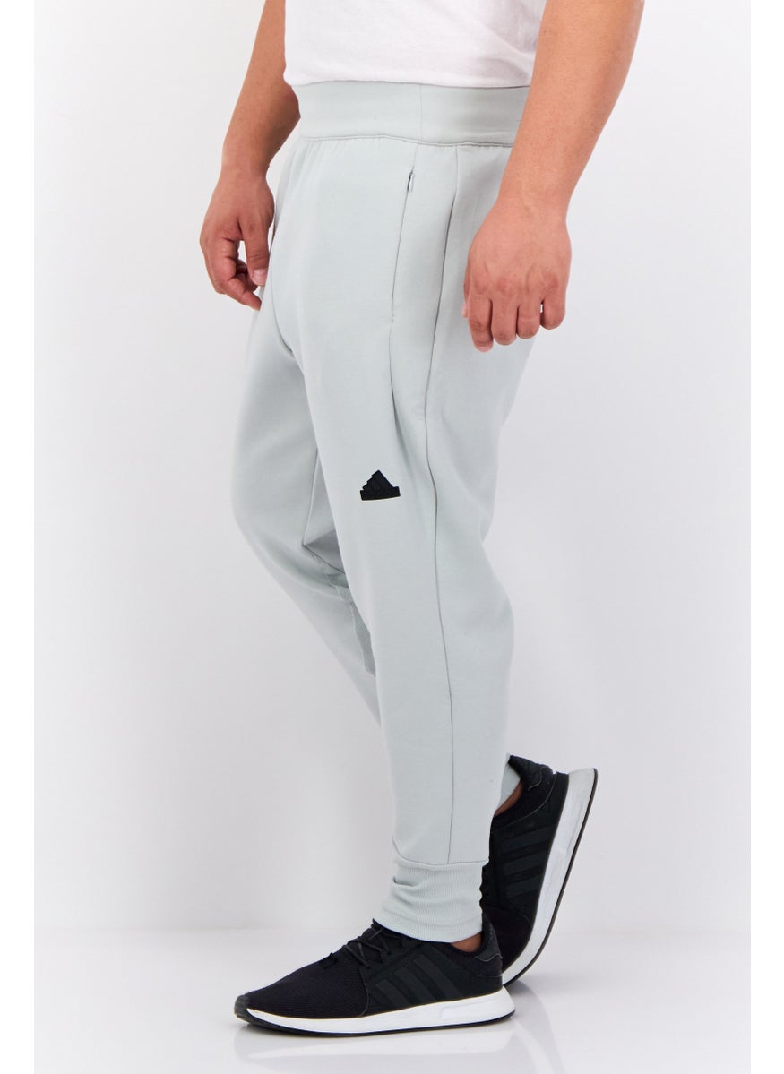 Adidas - Men Sportswear Fit Outdoor Sweatpants, Sage Green - Image 1