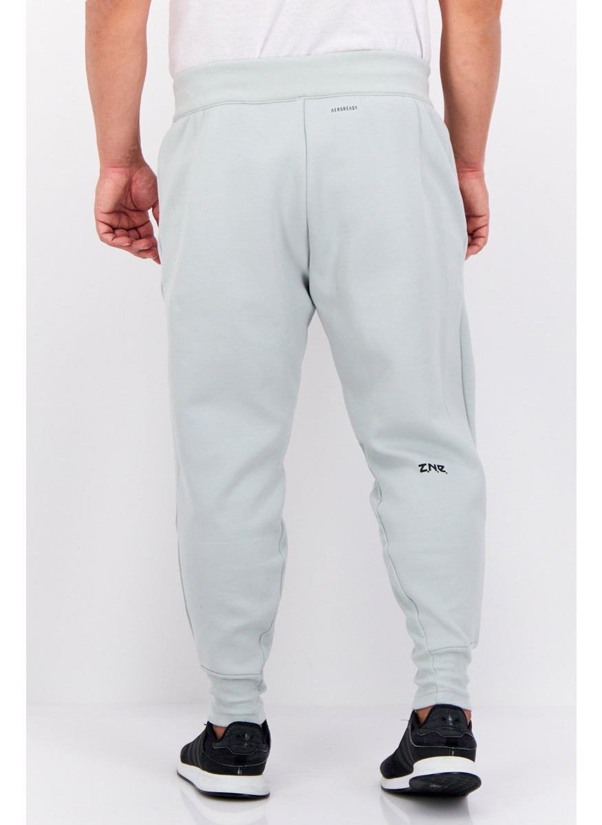 Adidas - Men Sportswear Fit Outdoor Sweatpants, Sage Green - Image 1